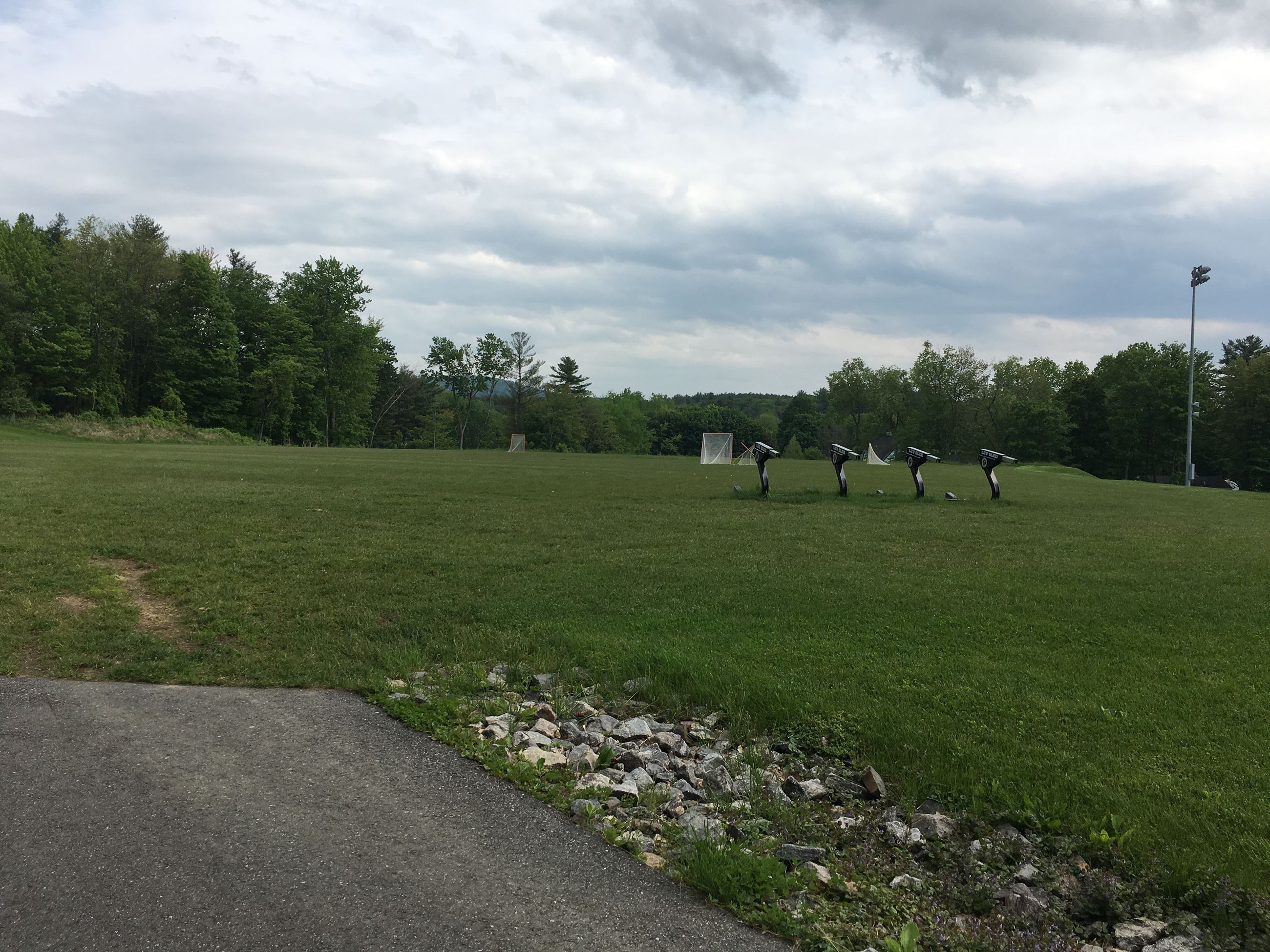 A photo of Bobotas Field which includes both football and lacrosse equipment