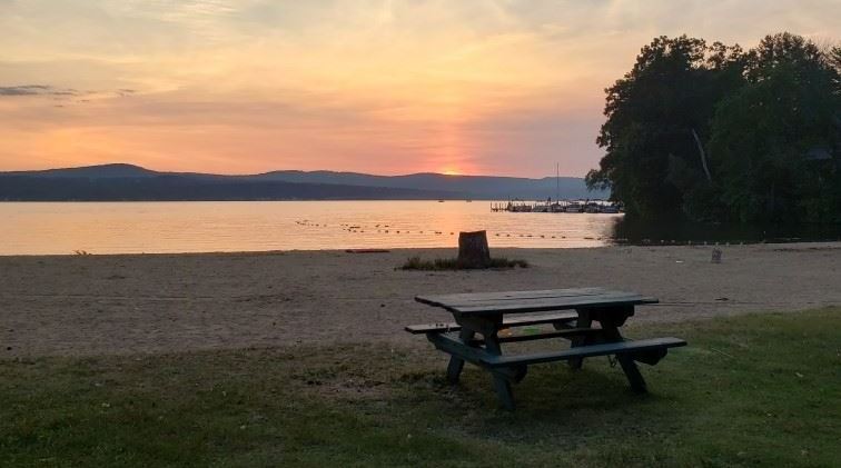 A photo of the sunset off of Bartlett Beach