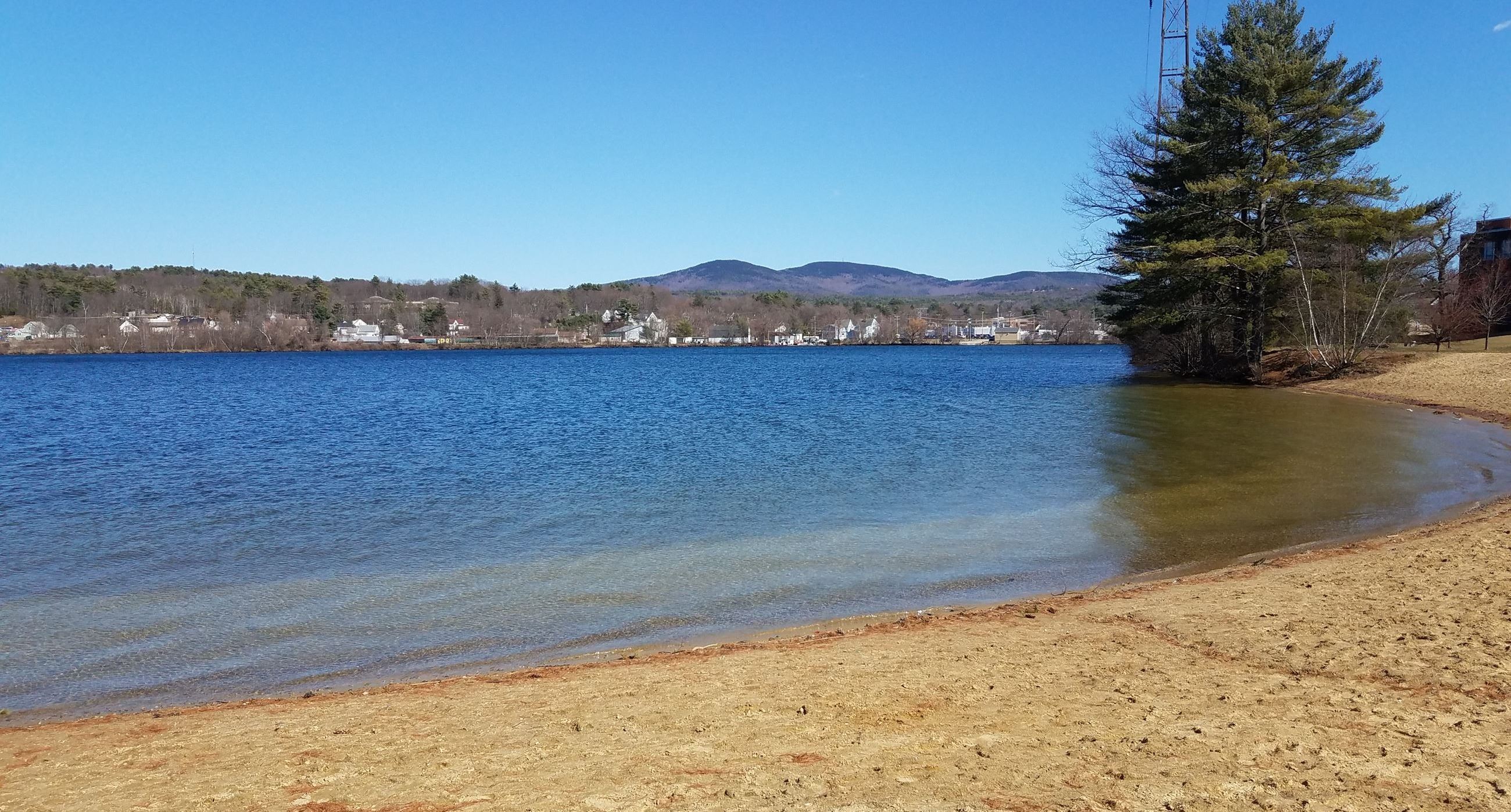 A photo of the Opechee Point Beach